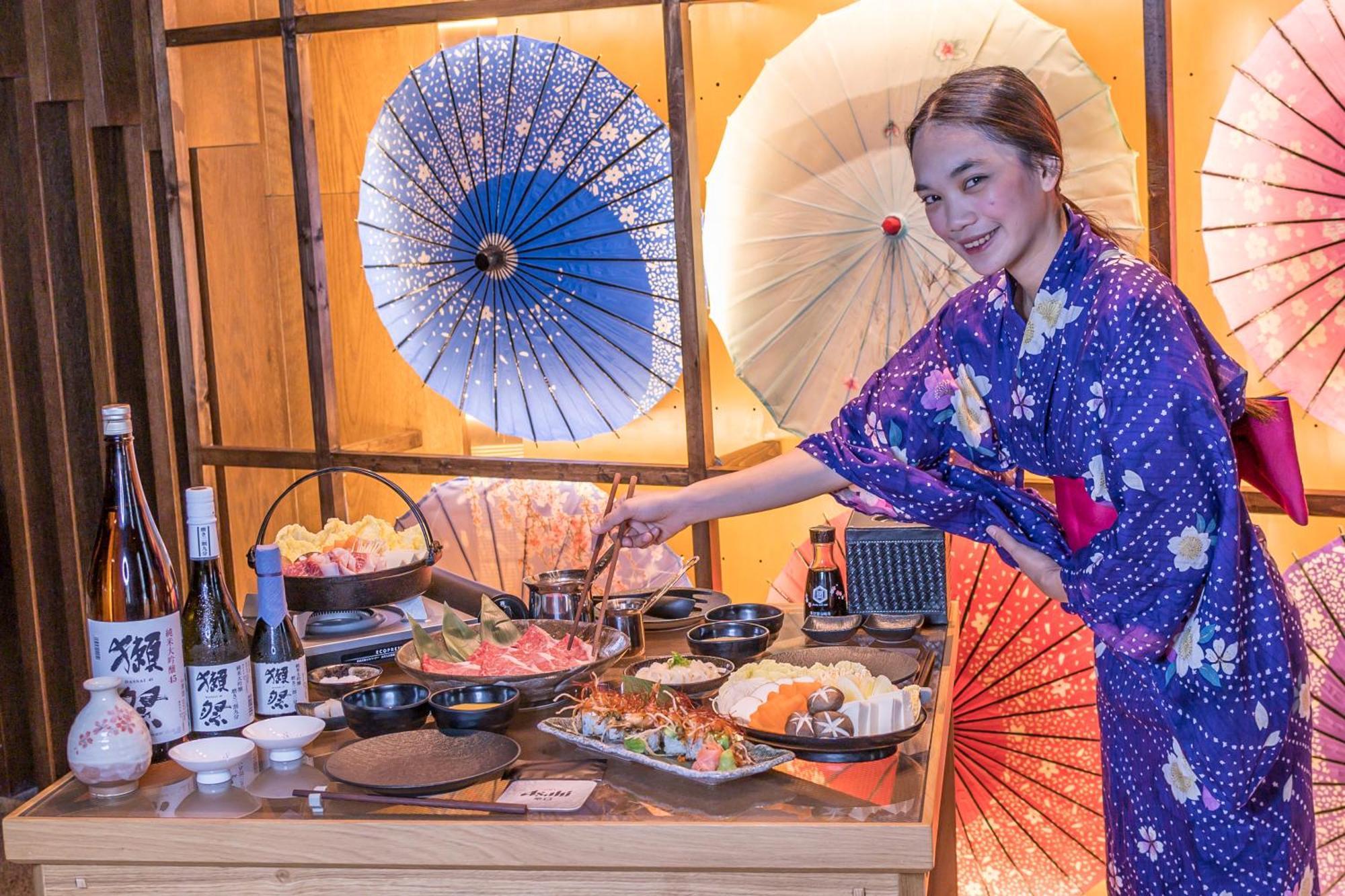 Stella Di Mare Dubai Marina Hotel Esterno foto A woman in a yukata cooking